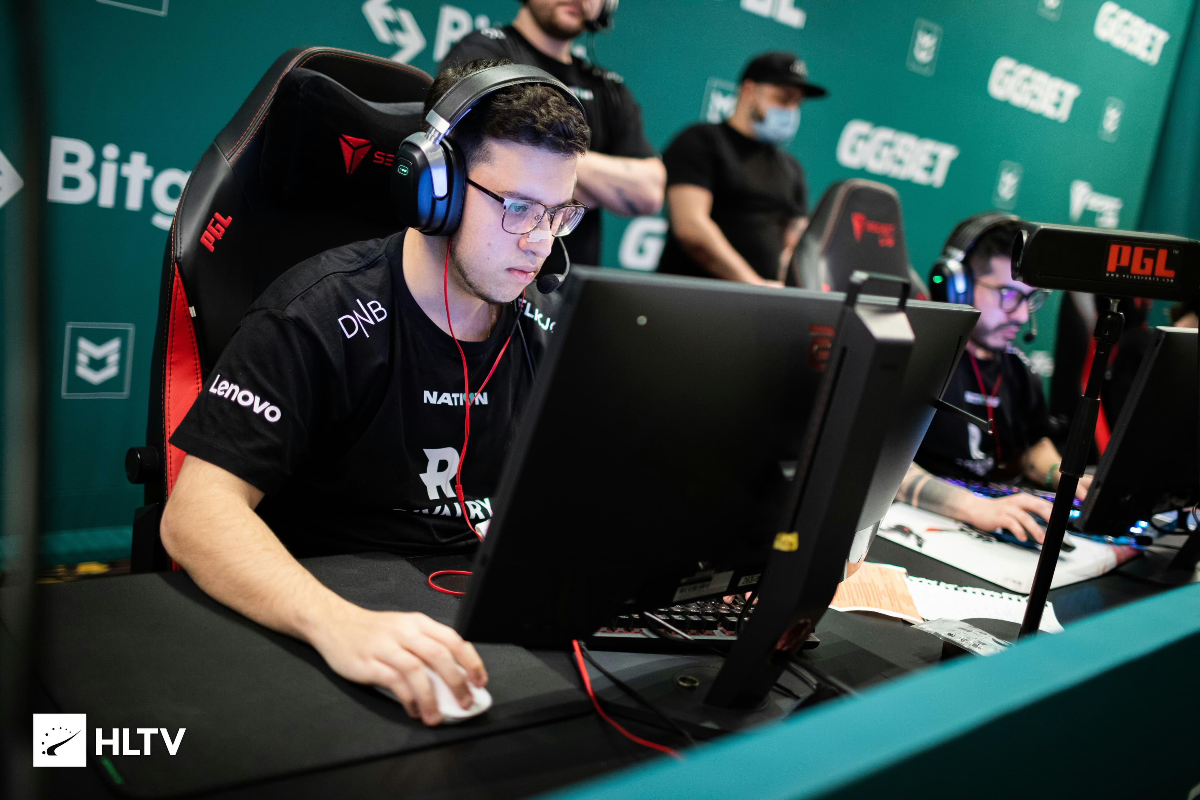 Professional gamer in action, intense gaming moment, esports tournament atmosphere